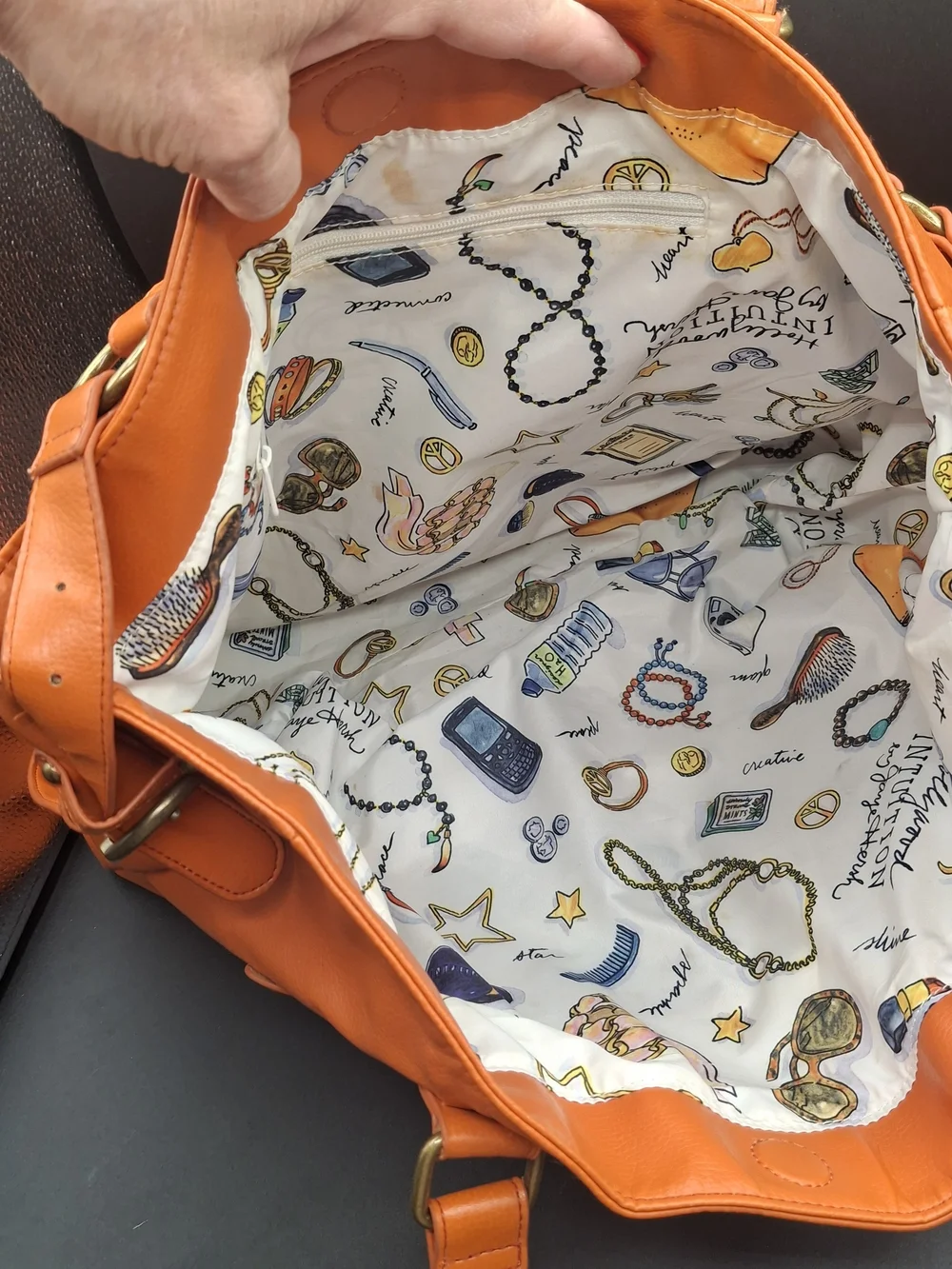 Women's Orange Leather Tote Bag with Ring-Link Accent